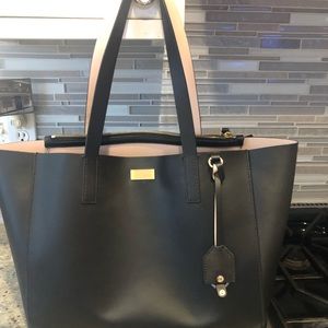 Kate Spade black tote bag with pink interior